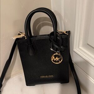 Michael Kors Black Mini Bag with Gold Accents